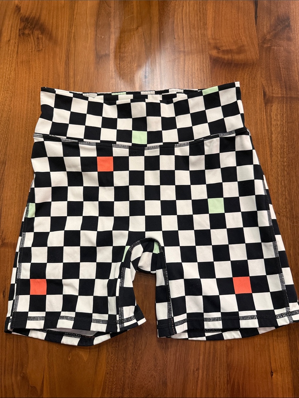 Fabletics Black & White Checkerboard Athletic Shorts with Red and Green Accents